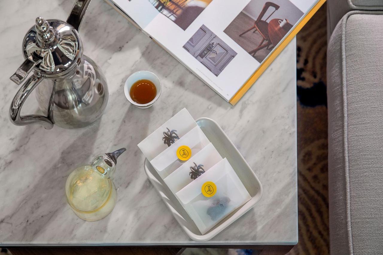 Voco Al Khobar By Ihg Hotel Exterior photo A set of three tea bags
